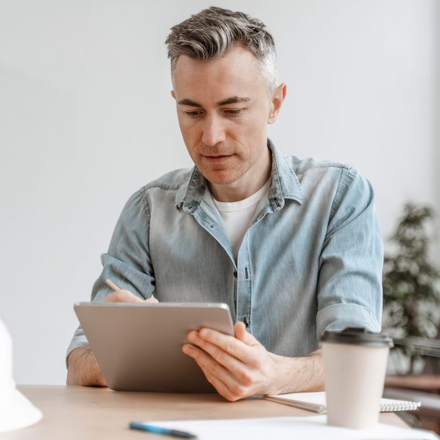 portrait-man-working-tablet